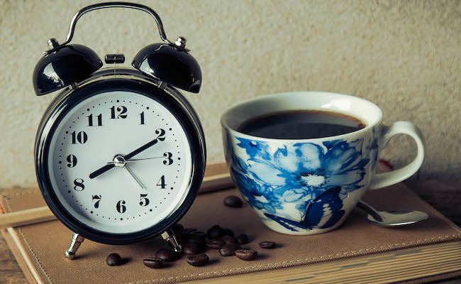 clock and coffee cup