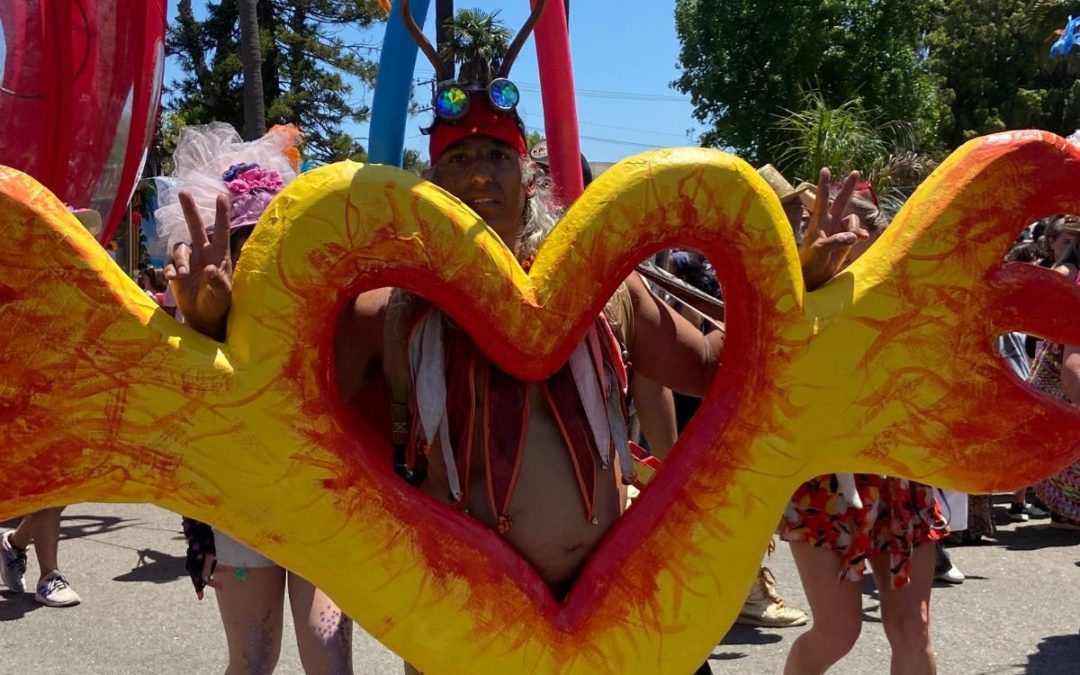parade man with heart costume